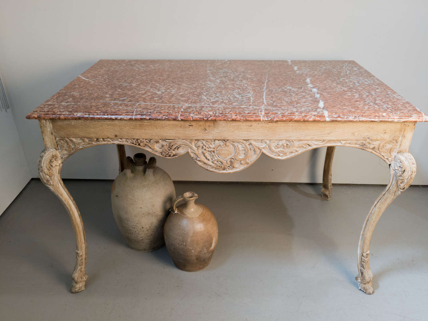 A 19th Century French oak table with marble top