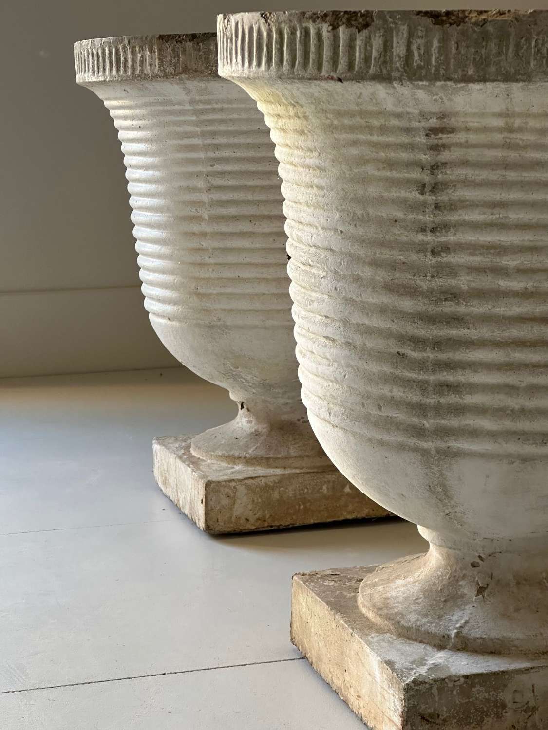 C1930 A Pair of French Ribbed & Reeded Concrete Urns