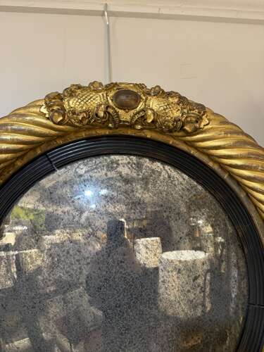 C1830 A Stylish British Regency Gilt Convex Mirror.