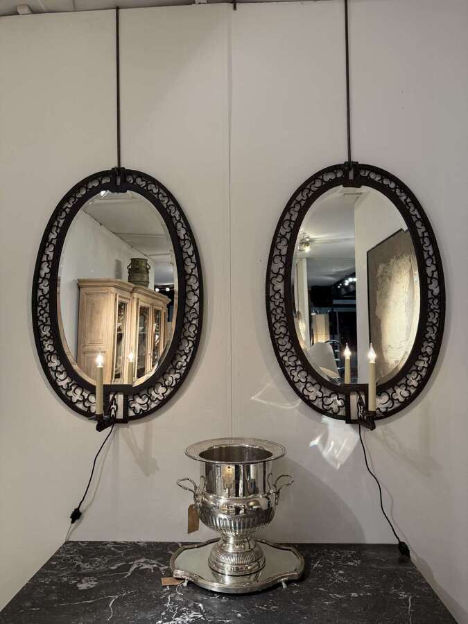 C1930 A Pair of French Girandole Oval Mirrors in the style of Edgar Brant