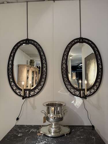 C1930 A Pair of French Girandole Oval Mirrors in the style of Edgar Brant