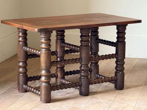 C1950 A French Oak Occasional Table Attributed to Dudouyt