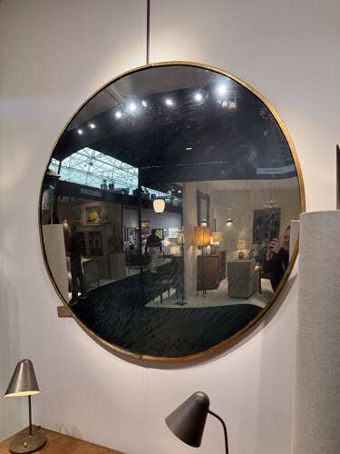C1950 An Eastern European Large Convex Mirror in Gilt Iron Frame