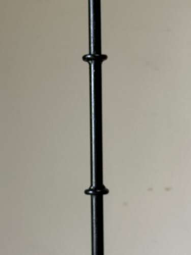 C1950 A French Iron Reading Lamp in the Style of Royere